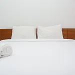 Comfy Studio Room At Patraland Urbano Apartment By Travelio